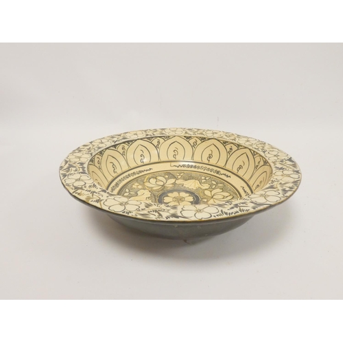 239 - Antique Chinese Cizhou circular basin with floral and lotus decoration. Diameter 34cm. 