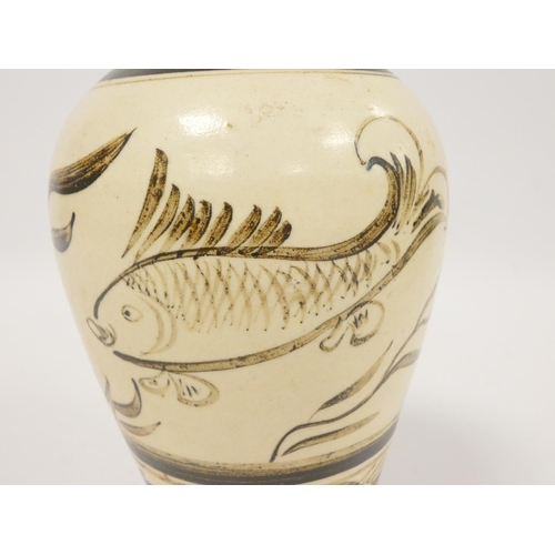 248 - Chinese Cizhou baluster form jar decorated with carp and reeds. Height 25cm. 