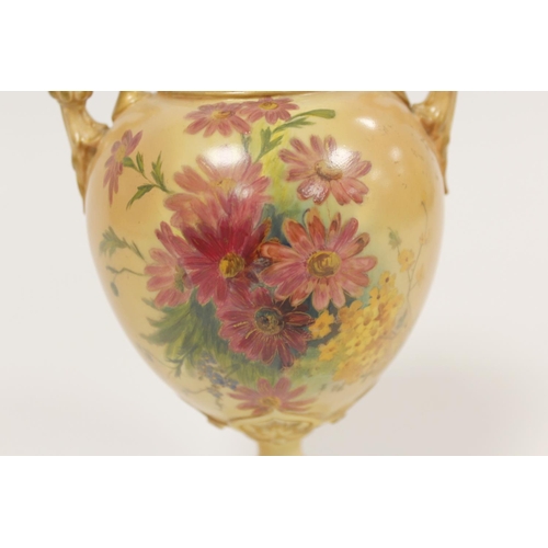 212 - Royal Worcester blush ivory twin handled pedestal vase decorated with hand painted carnations, patte... 