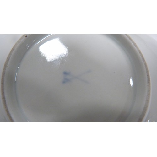 Continental Meissenstyle cup and saucer, the handle of the cup