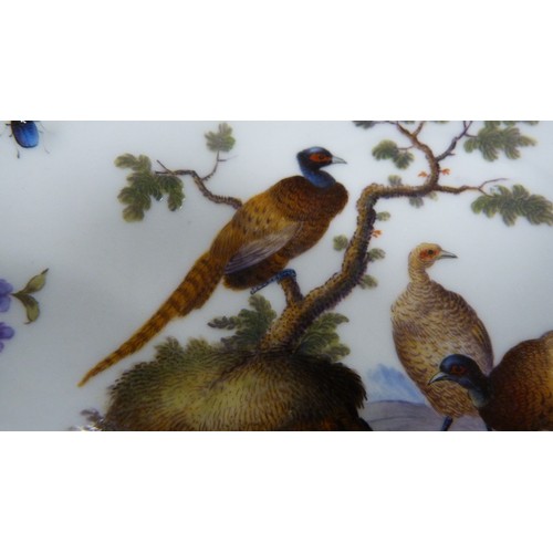 Continental Meissenstyle cup and saucer, the handle of the cup