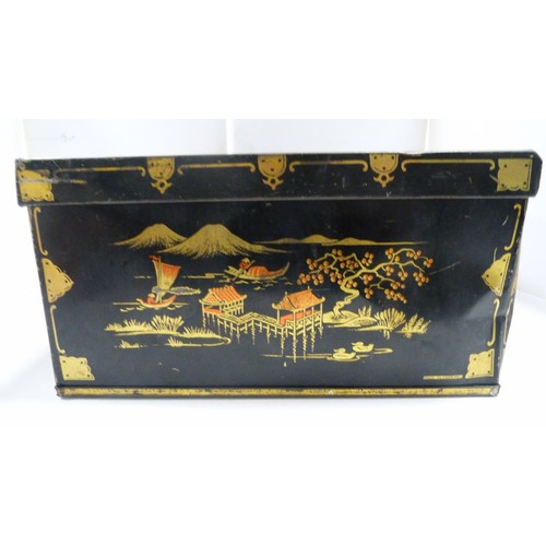 409A - Two Japanese tin boxes containing two Chinese patch boxes, bugle and miscellaneous coinage.