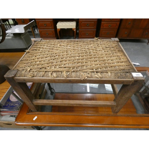 344 - Arts and crafts style rattan topped footstool.