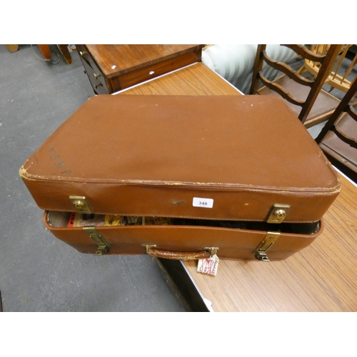 348 - Vintage brown suitcase and contents.