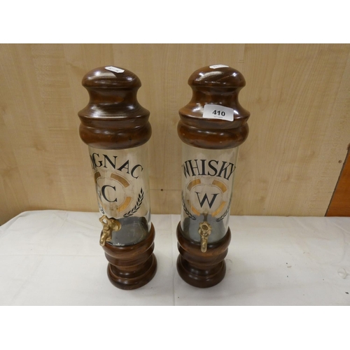 410 - Two spirit decanters to include cognac and whiskey.