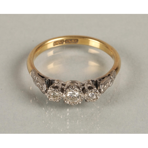 136 - 18ct gold and platinum ring set with three diamonds in illusion setting, ring size P, 3g