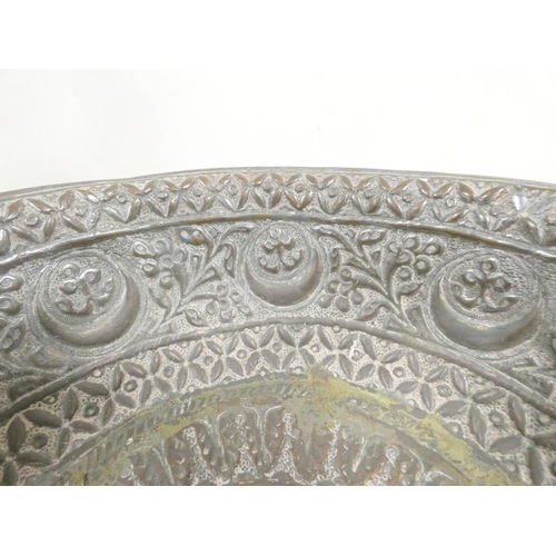 282 - Antique Persian damascened tinned copper wash jug and bowl, both profusely bearing repousse scrolled... 