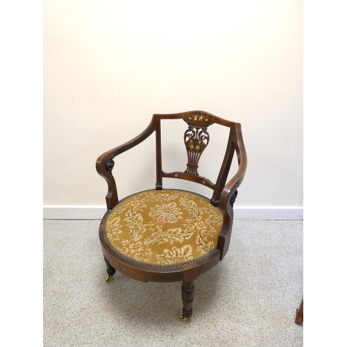 441 - Edwardian upholstered mahogany tub chair with scrolled floral backrest decorated with lion masks and... 