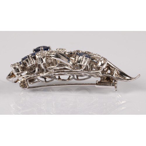 52A - Ladies 14ct whit gold Diamond & Sapphire cluster brooch, set with nine oval cut Sapphires and tw... 