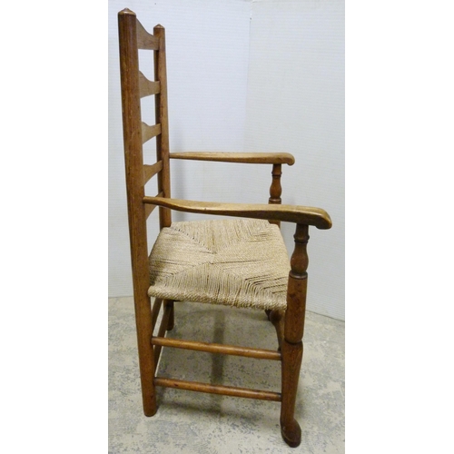 549 - Ash and elm ladder-back carver chair, c. early 20th century, with woven seat, on turned supports and... 