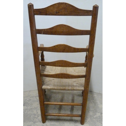 549 - Ash and elm ladder-back carver chair, c. early 20th century, with woven seat, on turned supports and... 