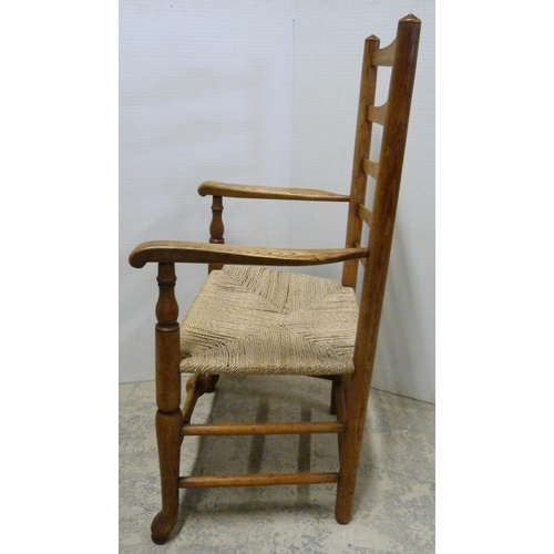 549 - Ash and elm ladder-back carver chair, c. early 20th century, with woven seat, on turned supports and... 