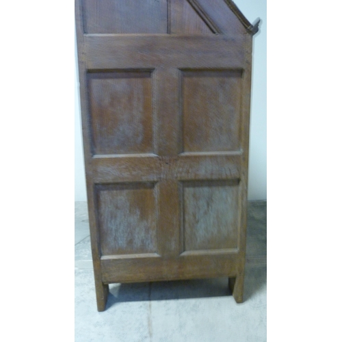 551 - Antique oak lectern with sloped ledge to the front above six panels, flanked by reeded columns, with... 