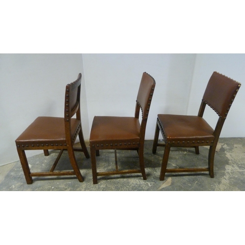 552 - Near-set of thirty oak English dining chairs, c. 1950s, with studded upholstery, stamped to the unde... 