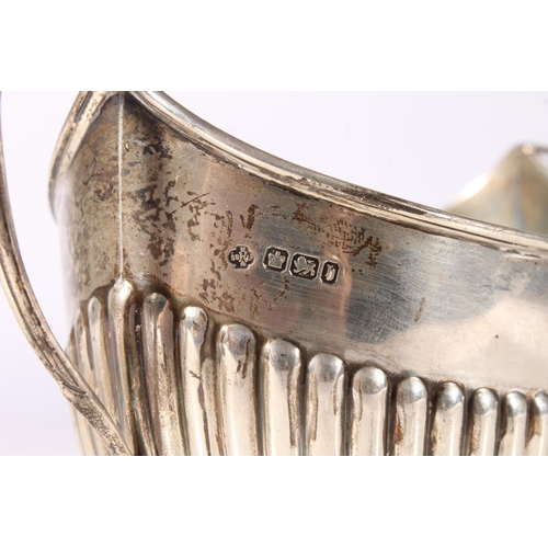 546 - Victorian silver sugar bowl of boat shape with half gadrooned decoration by William Hutton & Son... 