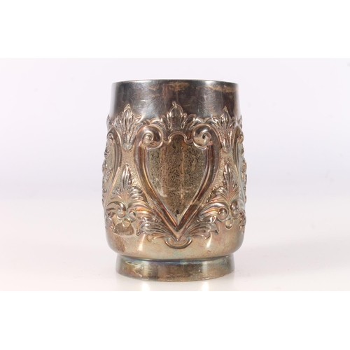 548 - Antique Victorian silver christening mug with repousse and chased floral ornament, makers mark rubbe... 