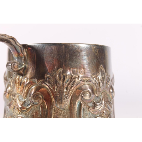 548 - Antique Victorian silver christening mug with repousse and chased floral ornament, makers mark rubbe... 