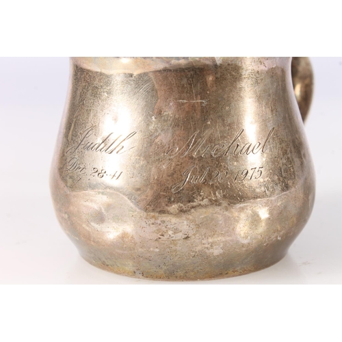 549 - Sterling silver christening mug by Birks, 95g.