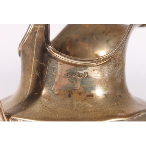 553 - Early 19th century silver cream jug, marks worn, 177g.