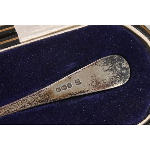 561 - Silver spoon by James Deakin & Sons (John & William F Deakin), Sheffield 1928, a silver napk... 