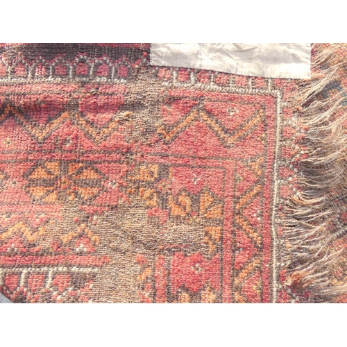 388 - Large 19th Century Persian Bokhara, red and blue rug L320cm x W227cm.