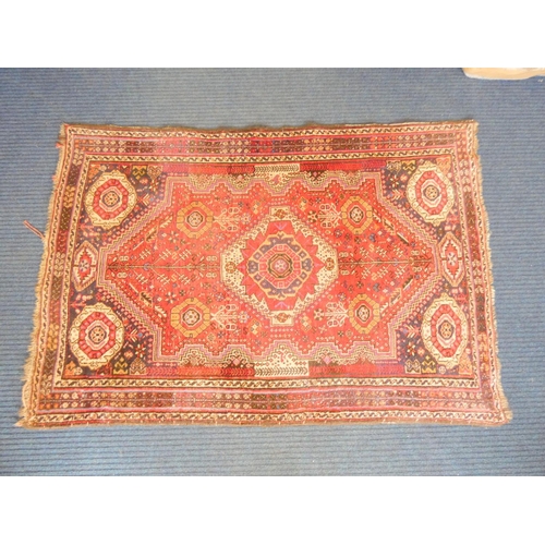 392 - Handmade Iranian red, cream and black rug L172cm x W117cm.