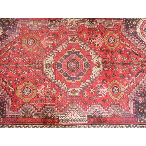 392 - Handmade Iranian red, cream and black rug L172cm x W117cm.