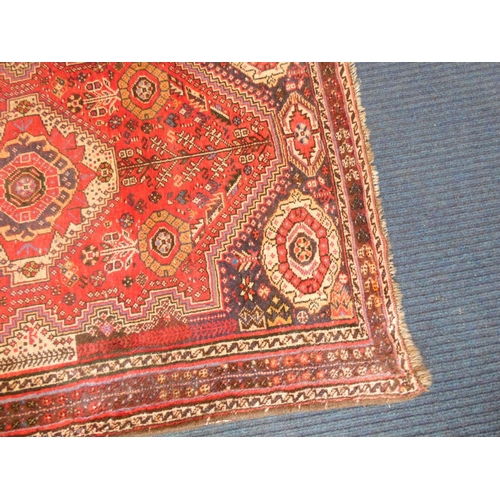 392 - Handmade Iranian red, cream and black rug L172cm x W117cm.