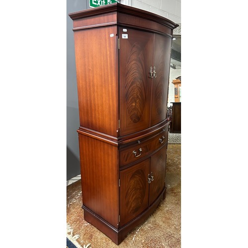 614 - Reproduction mahogany drinks cabinet, 153cm high