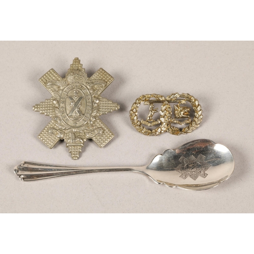 229 - Two Black Watch cap badges & Black Watch silver spoon, Sheffield 1911