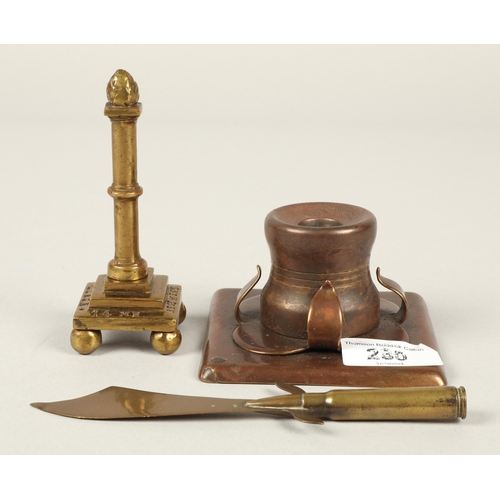 230 - Three pieces of trench art to include candle stick, letter opener, and 14 [E]ME Regiment Deligne Lie... 