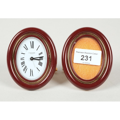 231 - Cartier Paris burgundy desk clock with matching photo frame