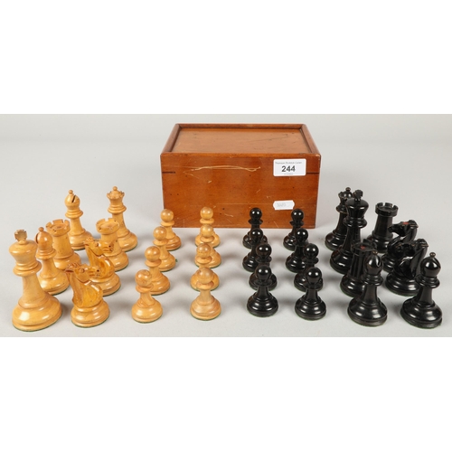 244 - Boxed wooden chess pieces