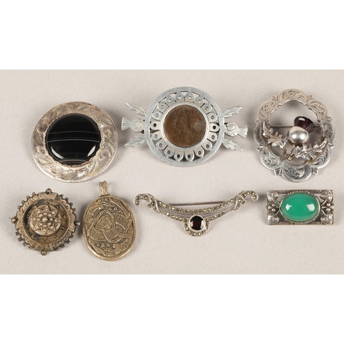 53 - Scottish Celtic design silver and white metal brooches to include silver brooch set with banded agat... 