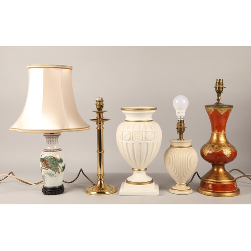 550 - Four assorted tables lamp & vase