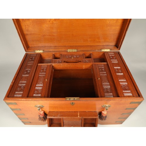 592 - Large brass bound storage trunk with internal carved Eastern-style storage compartments, H 58.5cm, W... 