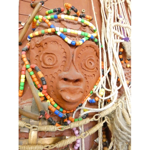 369 - Paul B Hardcastle. Abstract wall panel in the African style constructed from recycled material. The ... 