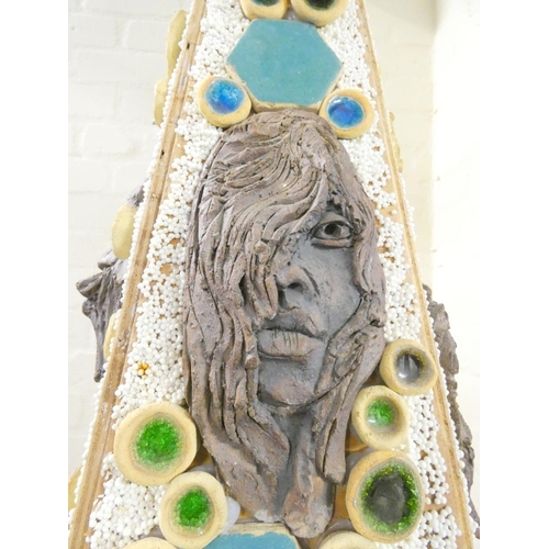 385 - Paul B Hardcastle. Large abstract ceramic mosaic obelisk constructed from recycled materials having ... 