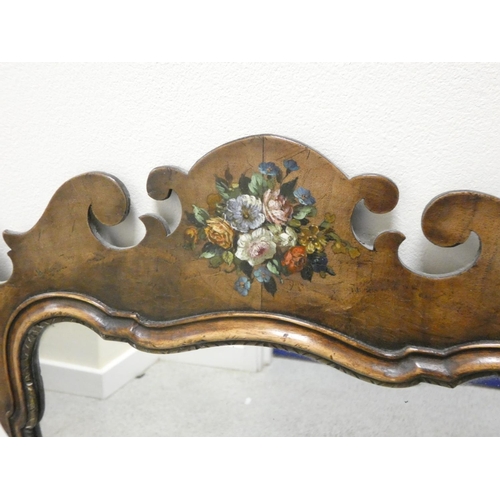 398 - Antique walnut fret framed mirror having scrolled pediment bearing painted panel of a floral bouquet... 