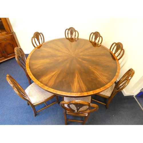 446 - Rackstraw, Worcestershire. An impressive flame mahogany and burr yew wood crossbanded circular dinin... 