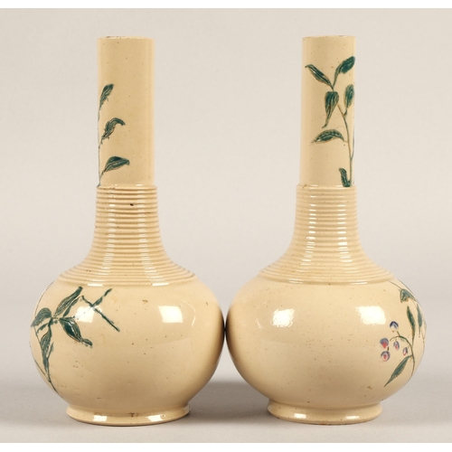 17 - Pair stem vases with green leaf design, 22cm high