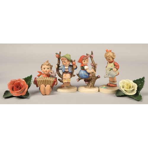 29 - Eight Hummel figurines & two Herend of Hungary rose figures