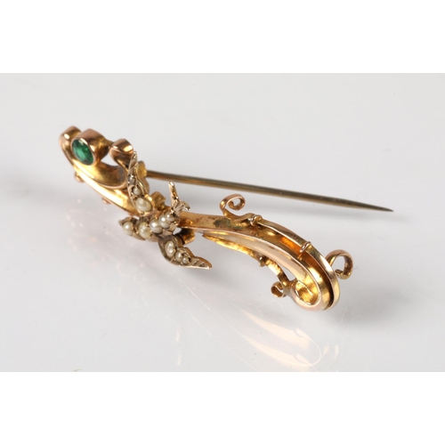 59 - 9ct gold bar brooch set with seed pearls and green paste gem, 2.3g