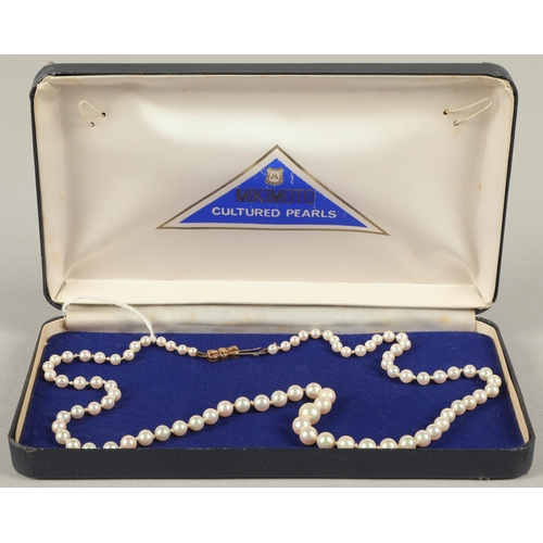 112 - String of pearls on 9ct gold clasp, in Mikimoto pearls box