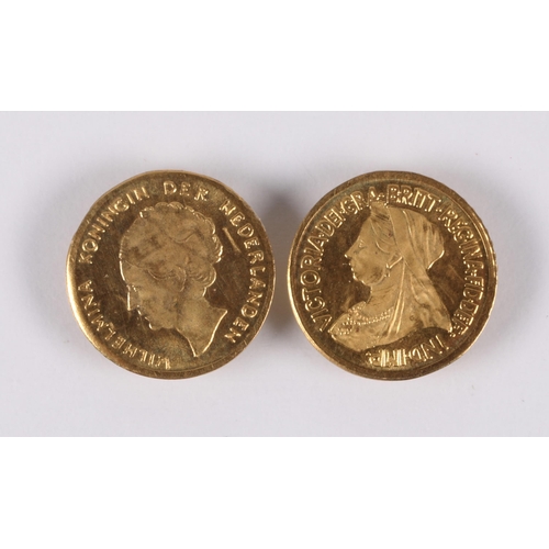 134 - Two gold coins, 0.22g gross weight, with frame for mounting