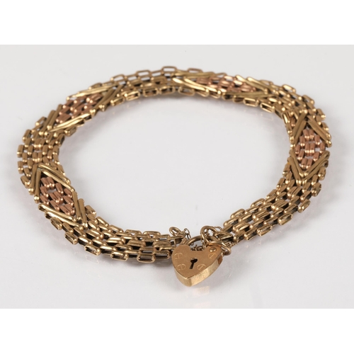 141 - 9ct gold gatelink bracelet with heart padlock clasp, 6.8g