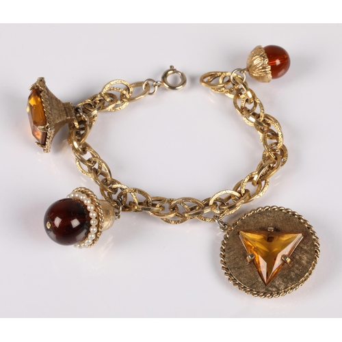 149 - Vintage gold tone bracelet with charms