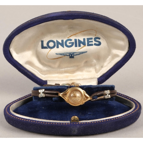 164 - 18ct gold cased Longines ladies wristwatch on leather strap