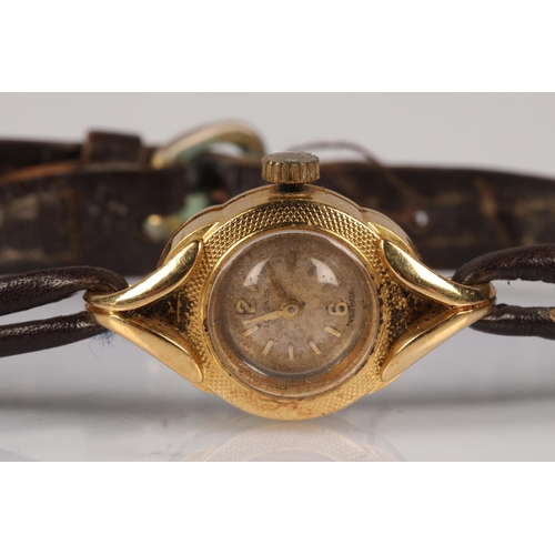 164 - 18ct gold cased Longines ladies wristwatch on leather strap