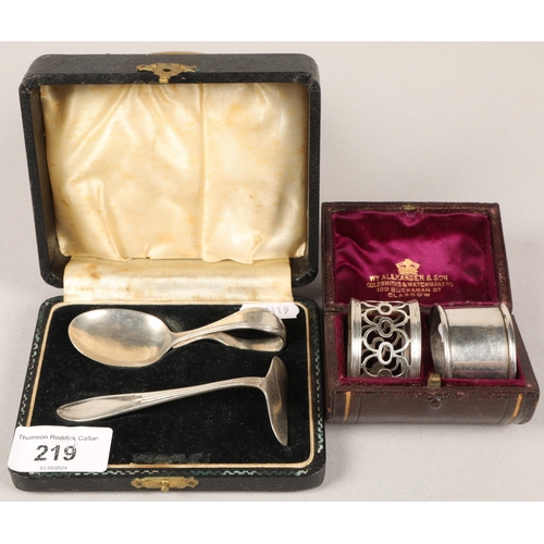 219 - Silver napkin ring and another white metal in fitted case, with cased hallmarked silver baby cutlery... 